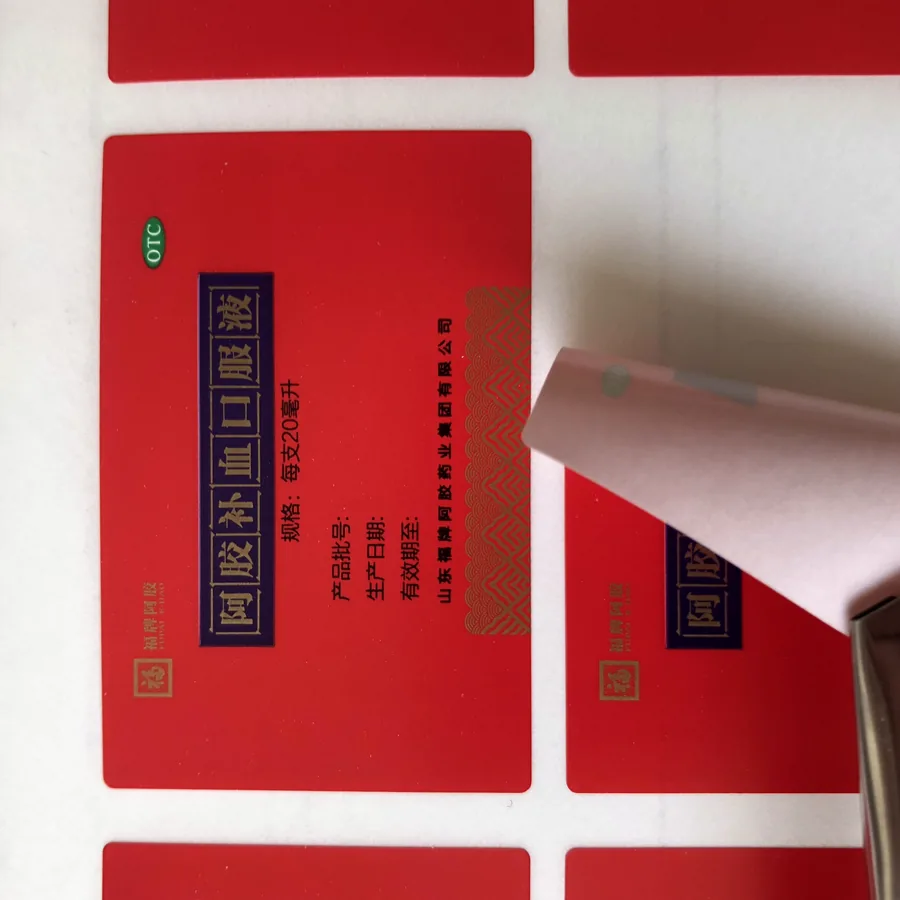 Printed label with a gold hot-stamped foil panel applied over the artwork